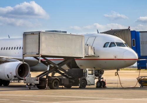 Passenger jet airplane docked on gate terminal of Athens international airport, Greece